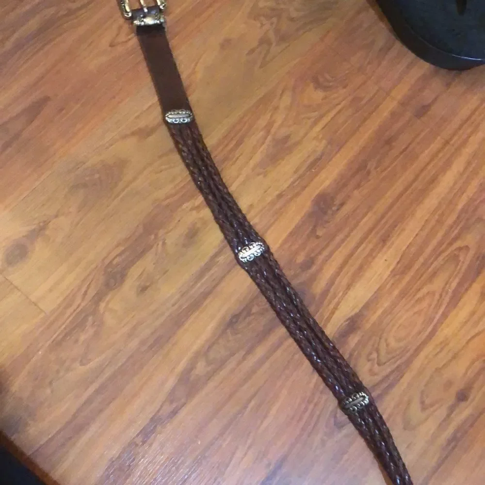 Brighton style genuine leather brown belt with silver detail.